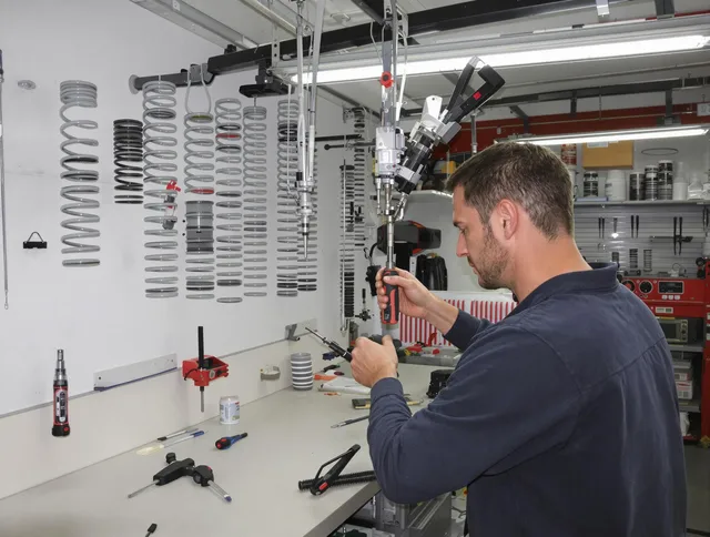 Strongsville Garage Door Repair safety certified technician performing precision spring replacement in Strongsville