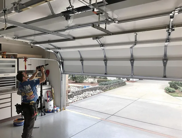 Garage door track repair service by Strongsville Garage Door Repair in Strongsville